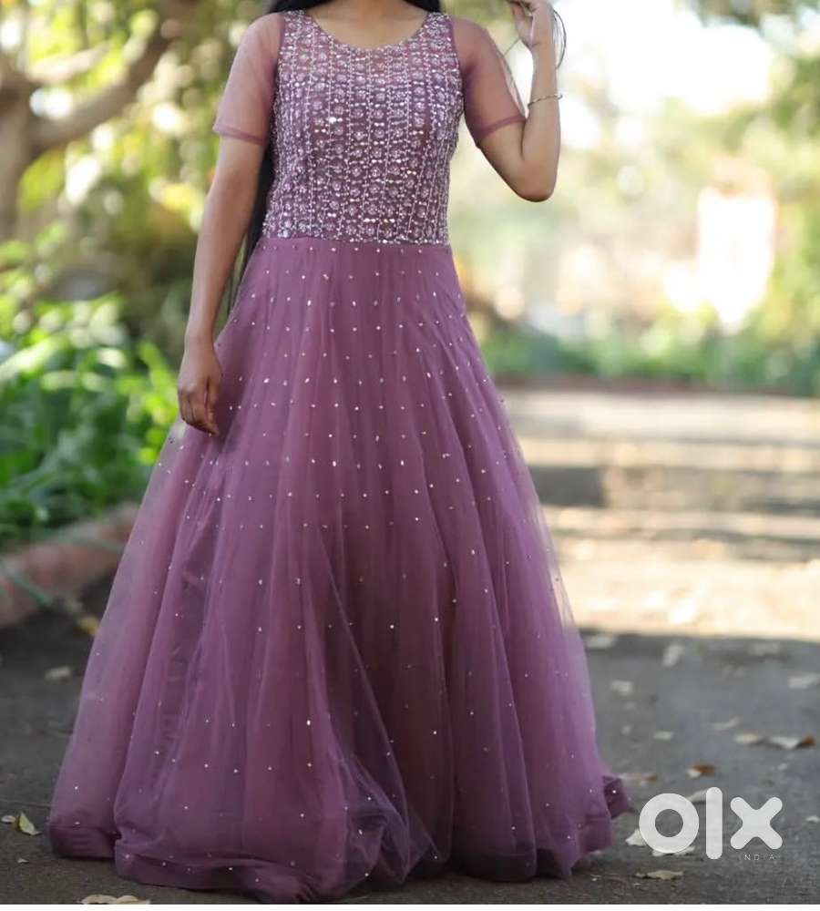 Elegant Mauve Net gown with Embellished Bodice- perfect for parties