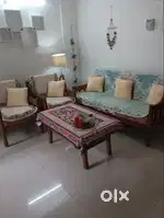 I WANT TO SELL MY USED SEGUN WOOD SOFA SET.