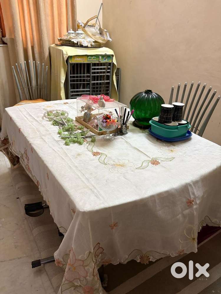 Glass Dinning table with 6 chair for sale
