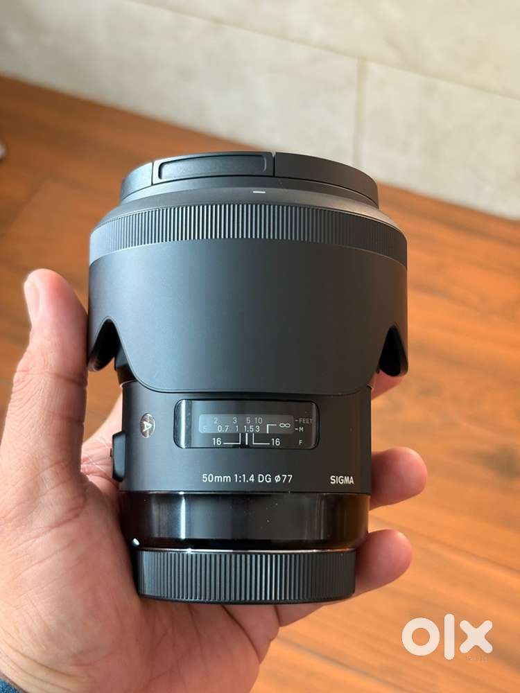 Sigma EF 50 F1.4 lens brand new open box