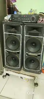12 -12 inches two bass  speakers and one amplifier