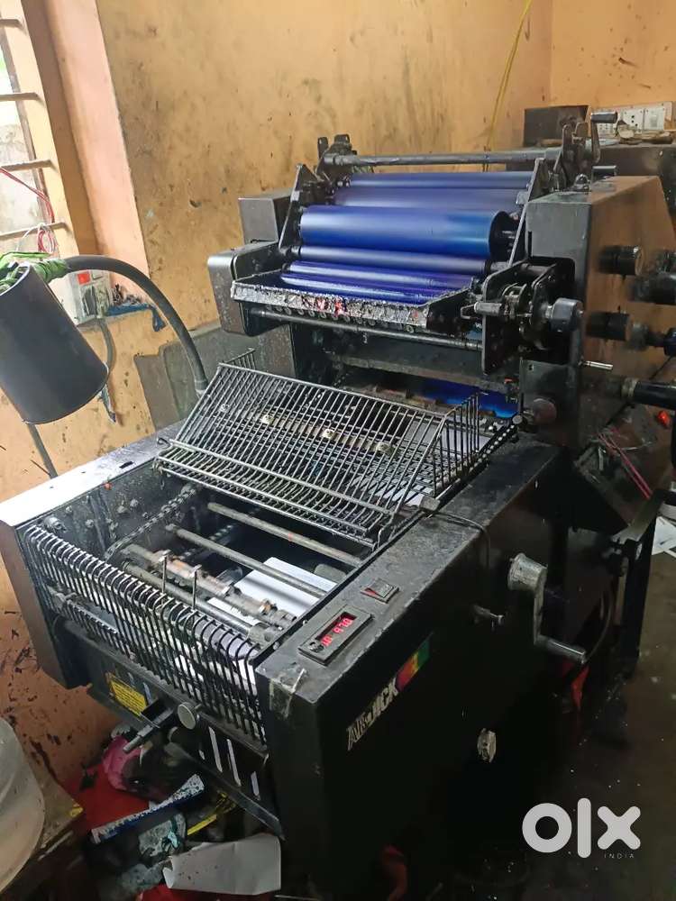 Offset printer and binding mechines