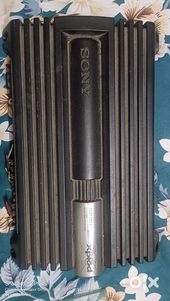 Car amplifier with bass tube and speakers