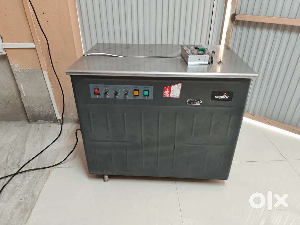 Packing / straping machine