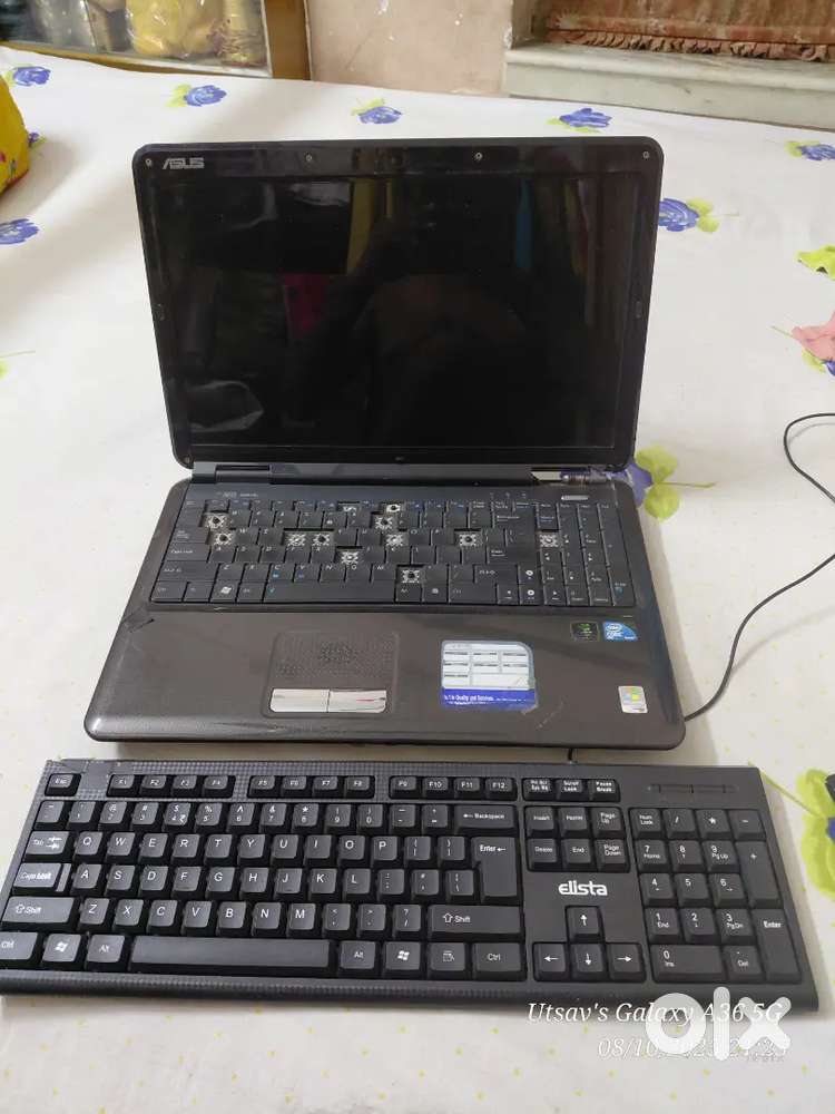 Asus laptop with external keyboard provided