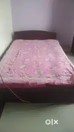 Wooden bed in a good condition