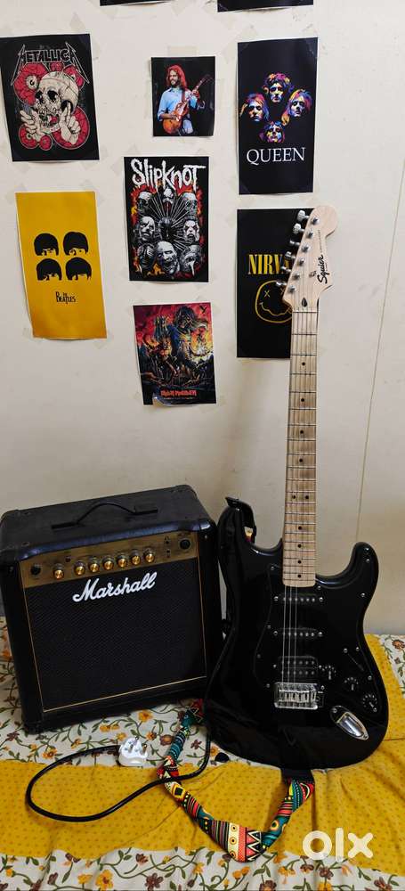 Selling my 9 month old Stratocaster (HSS) and my Marshall MG15R amp