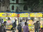 Momo shop seller& helper (girl and boy)