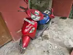 Hero honda pleasure red & black colour