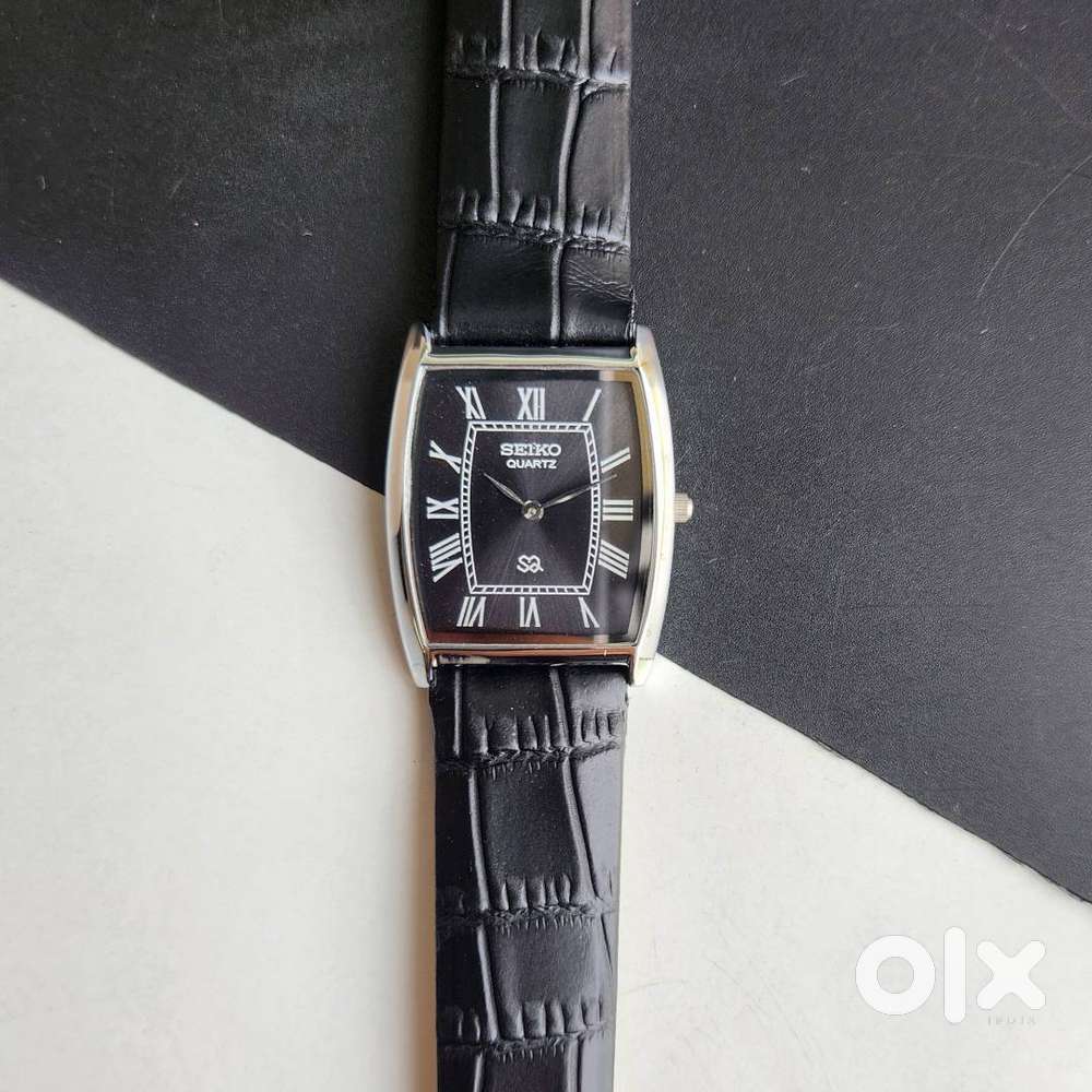 Seiko Slim Black Face Barrel Quartz Men's watch