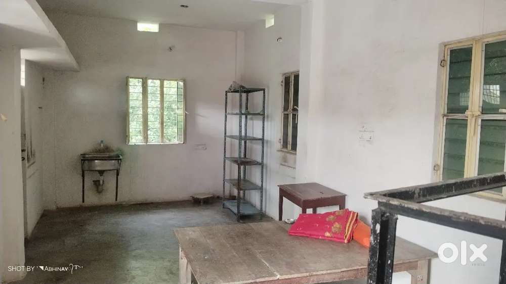 Semi-furnished rooftop room with bed, rack, table, sink,  privateentry