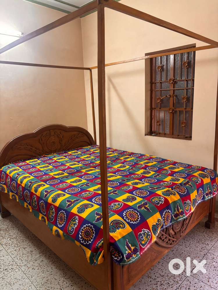Double wooden bed with storage