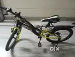 Cycle with shoker at the bottom of the seat fully modified