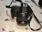 Canon R100 mirror less