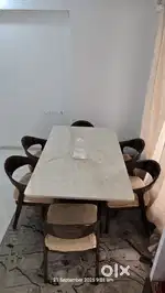 Moving out Sell 6 Seater Wooden Marbal top dining table