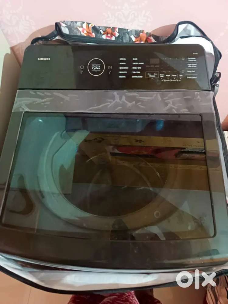 Rs-12000 Samsung fully automatic top load washing machine 1month old.