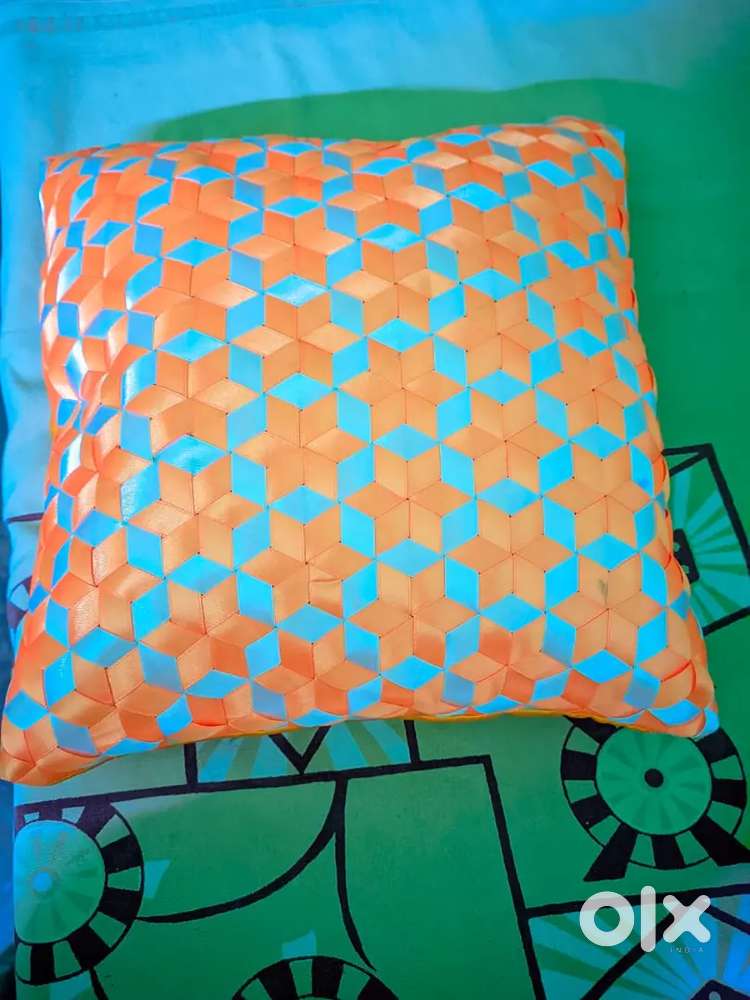 Cushion With Synthetic Ribbon Weave