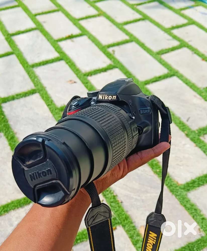 Nikon 3200D with 50mm 1.8D and 18-140mm lenses