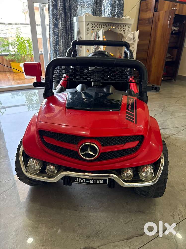 “Kids Ride-On Red Thar Toy Car – 4x4 Drive, Excellent Condition”