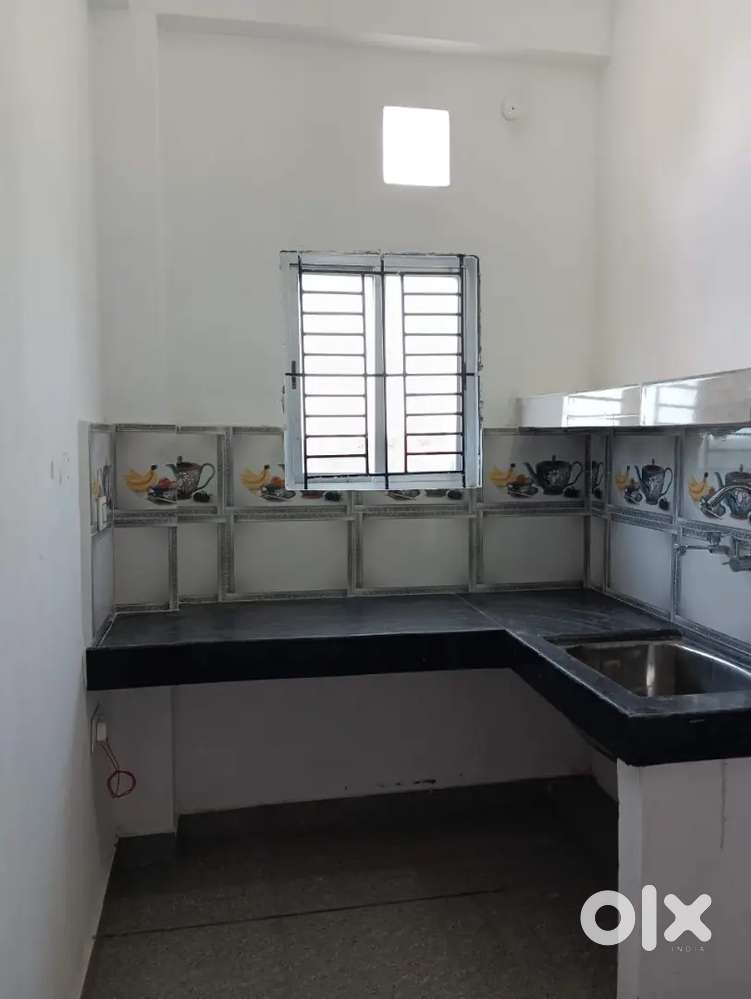 Room with tiles flooring and bike parking