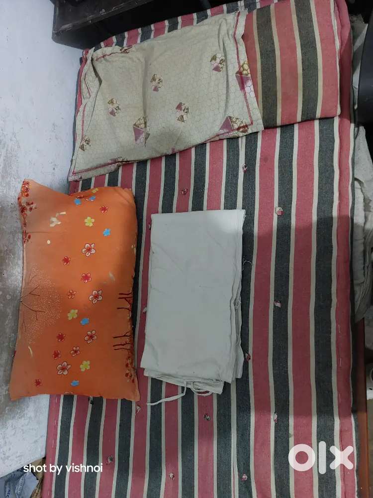 16kg white cotton ( रुई ) filled mattress + 2 pillow + 1 chair cushion