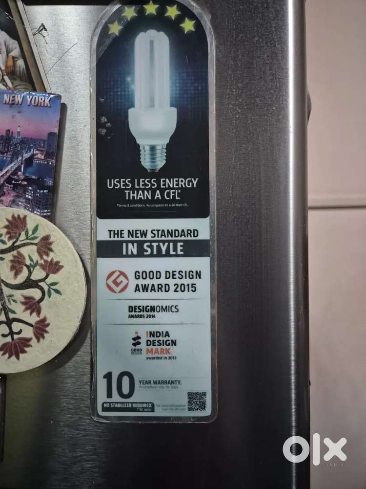 Fridge 5 yrs old in best condition market price 27 k