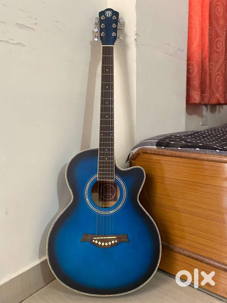 Beautiful blue acoustic guitar .( Ready to play)