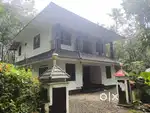 Spacious 11.5 Cent Property with 2300 Sqft Home & Outhouse for Sale!