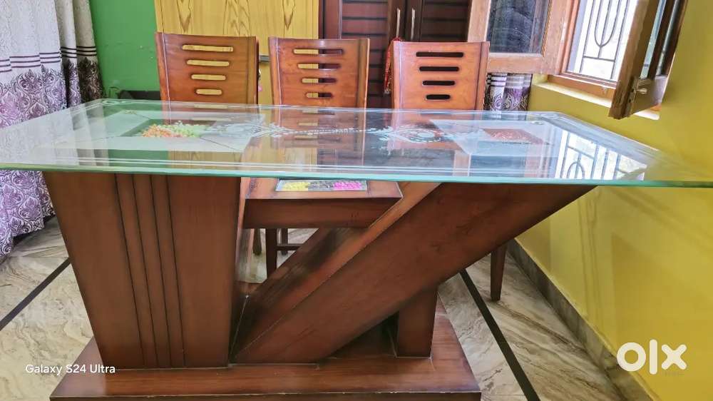 One Big daining table with six seater