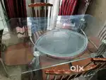 Six seater metal legs and glass top dinning table