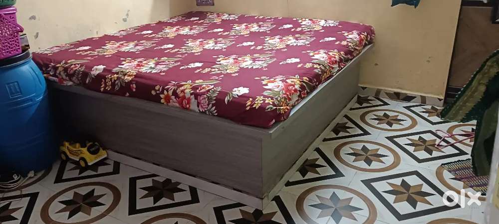 bed, blue bedsheet and water prouph playe