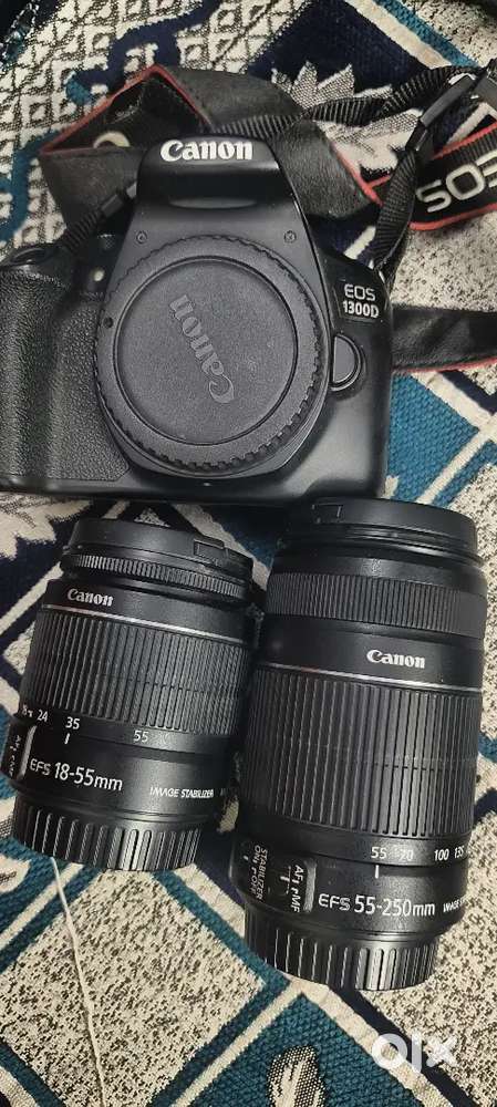 Cannon 1300D camera with 2 lenses.