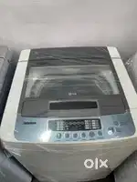 LG washing machine fully automatic top load with warranty 1 year old