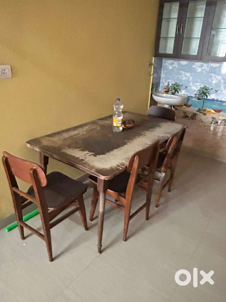 Teak wood dining table with 4 chairs