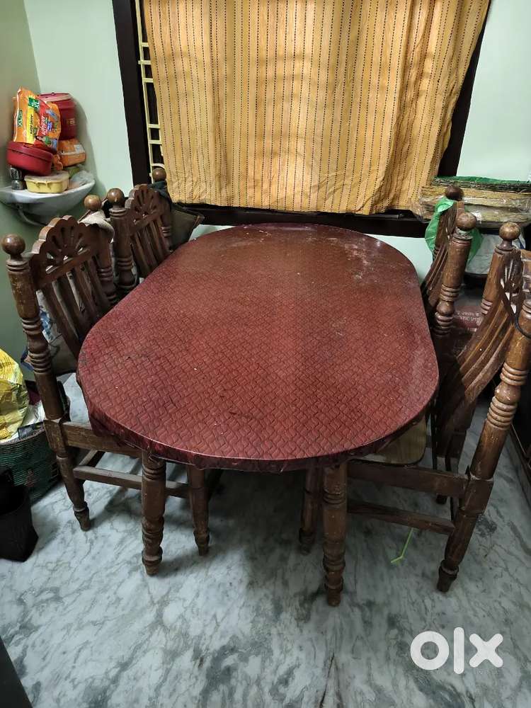 Selling 4+1 table teak dining table set is for 12000