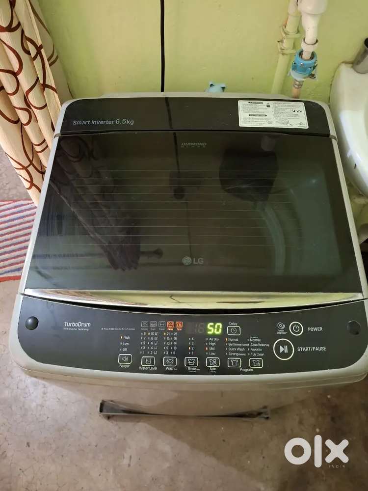 Brand Name- Lg.( 6.5 kg top load fully automatic washing machine.)