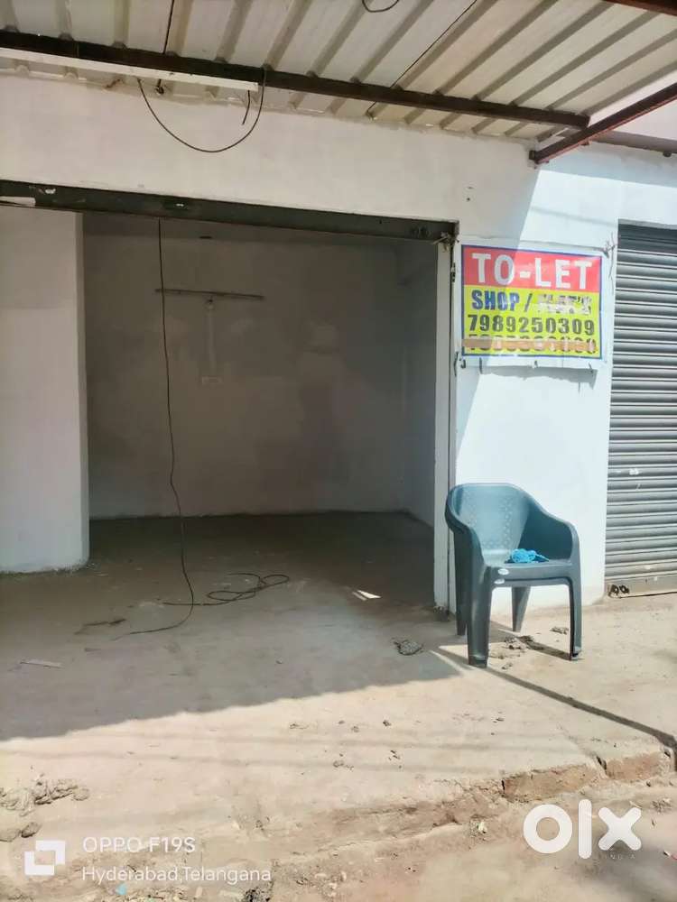 2 road 2 shops at X road 300mts from neknampur 100ft main road