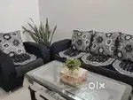5 Seater Sofa with Glass Tea table & an Iron wardrobe for sale.