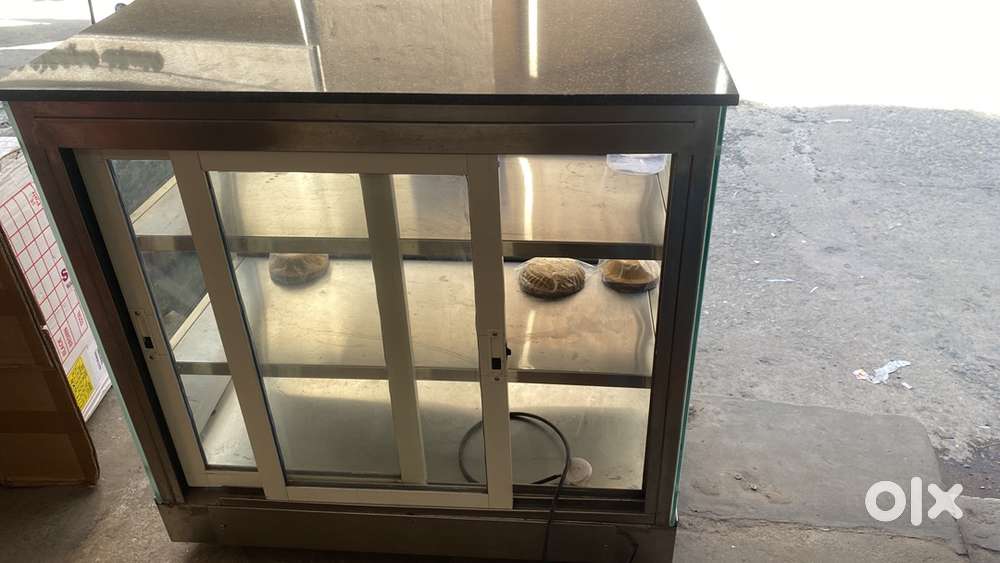 Display unit 3*3, steel table , chairs, deep frier , popcorn machine