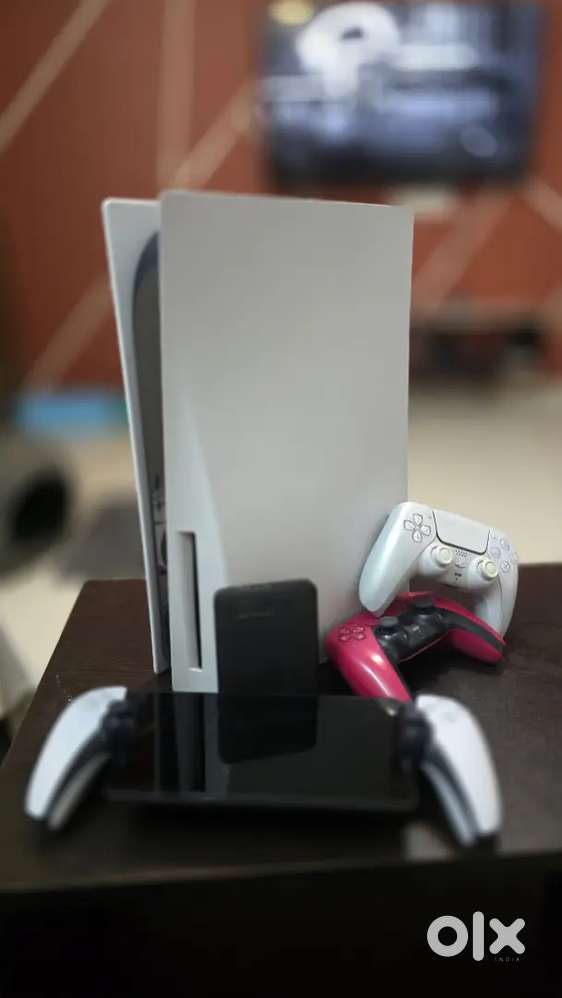 Ps5 with two controllers and wd element 1 tb hard-drive and psportal