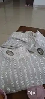 Curtains 9 feet blackout 250 each net 150 each total 8  both