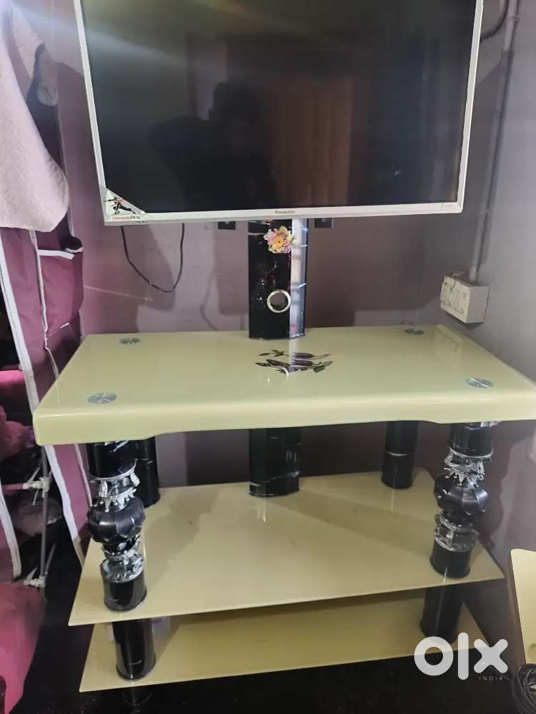 TV stand with disigning glass table