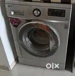LG front loading washing machine with dryer 8kg silver color