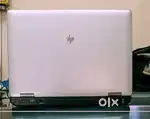 Hp laptop charging with mouse and pad
