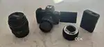 Canon m50, lence  regular 15-45, adaptor,  2 battery,1 chargar