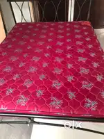 Queen Size Iron bed with Kurl on mattress