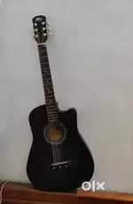 Steel string guitar