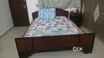 Bed and bedside table
