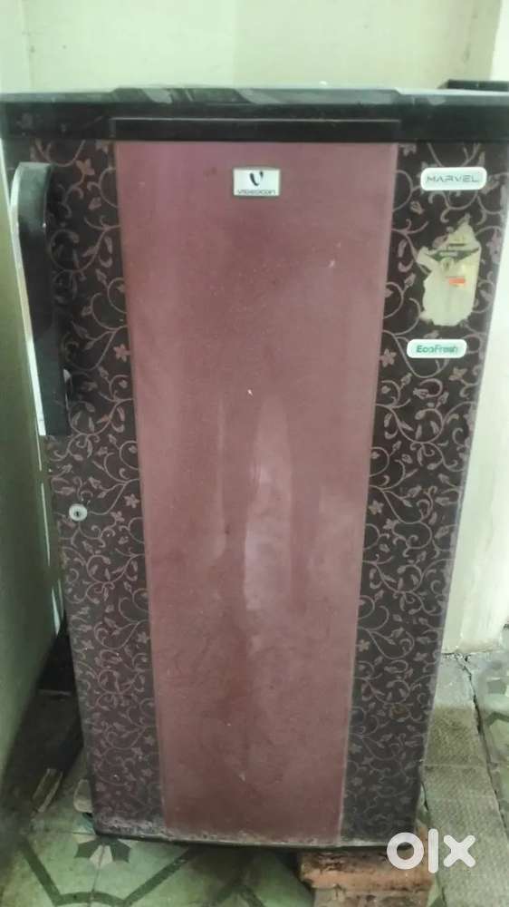 Old fridge in working condition 165 litre