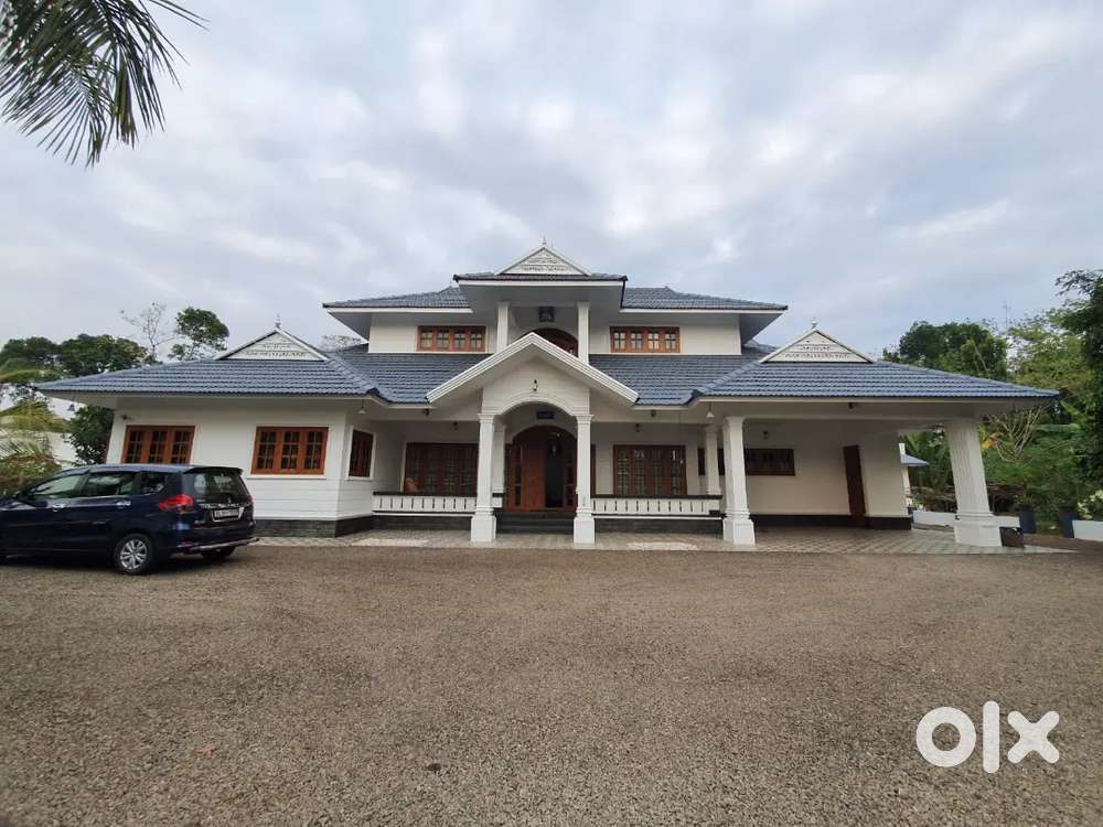 3.5 acre with a  posh house near Maragatypally Pala 4 CR negotiable